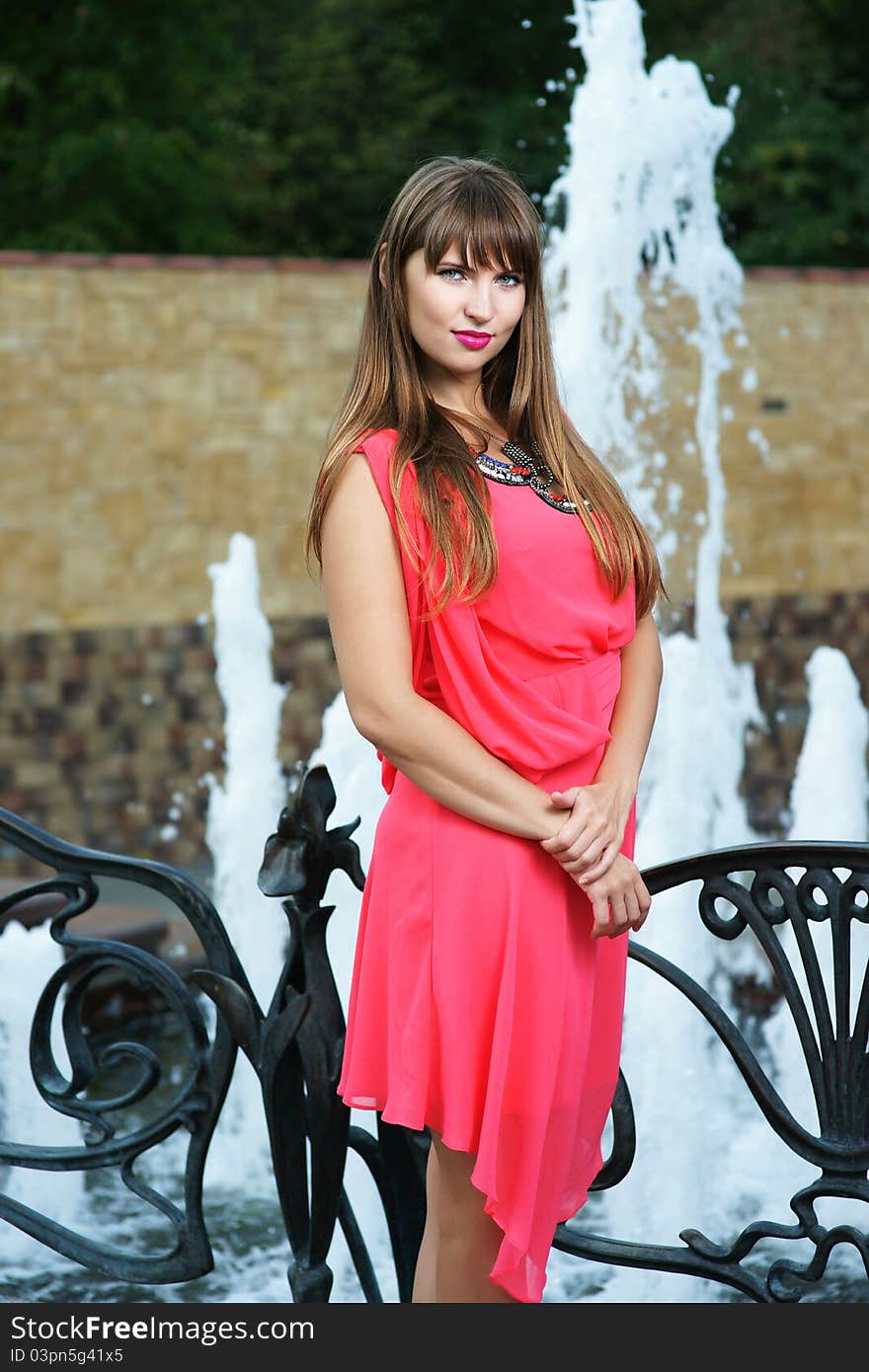 The girl near a fountain