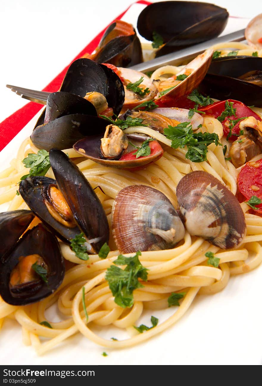 Photo of delicious pasta with clams and mussel