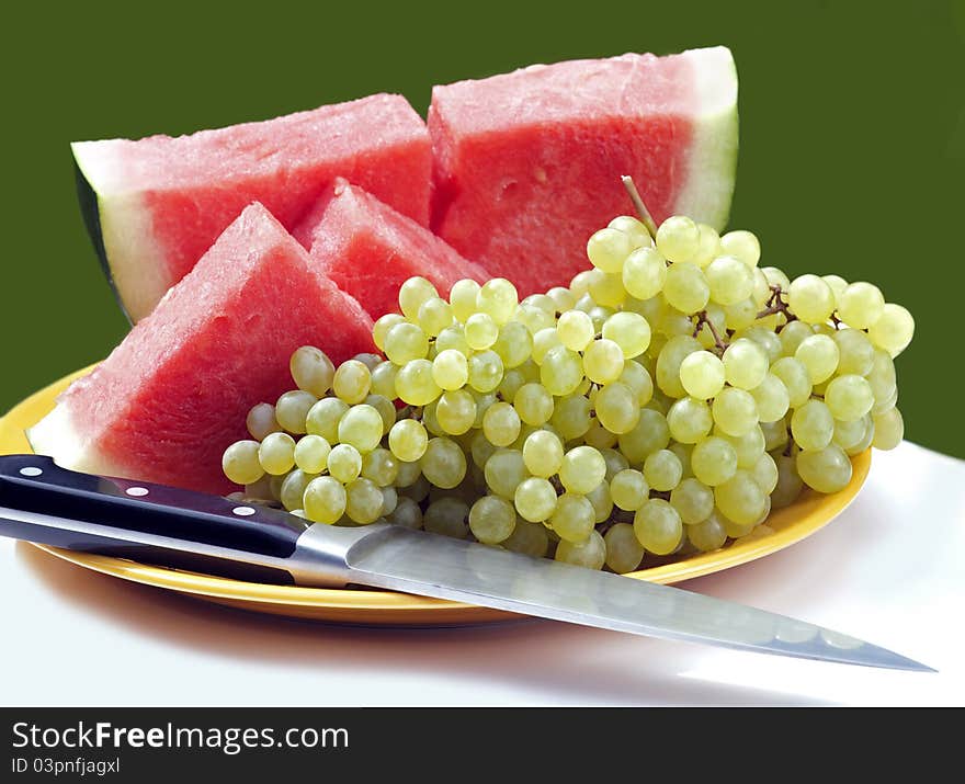 Cluster of Champagne vine and red water melon