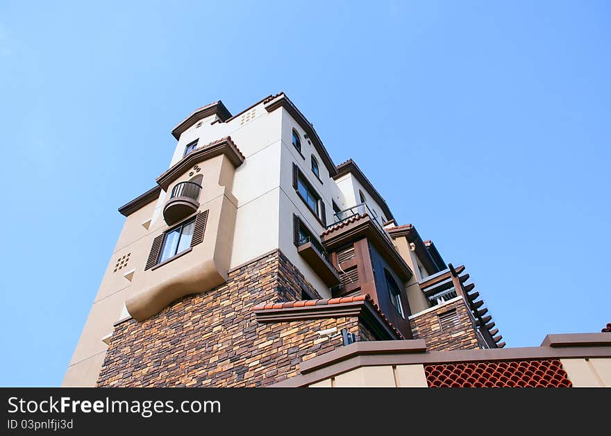 Modern apartment buildings in the blue sky. Modern apartment buildings in the blue sky.