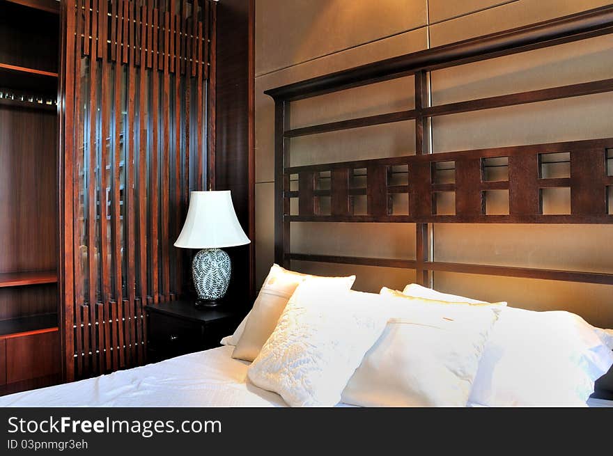 Bedroom decorated in oriental traditonal style, shown as featured home decoration culture and luxury ornaments and setting. Bedroom decorated in oriental traditonal style, shown as featured home decoration culture and luxury ornaments and setting.