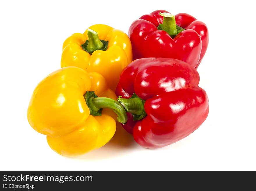 Yellow and red bell pepper on white background. Yellow and red bell pepper on white background