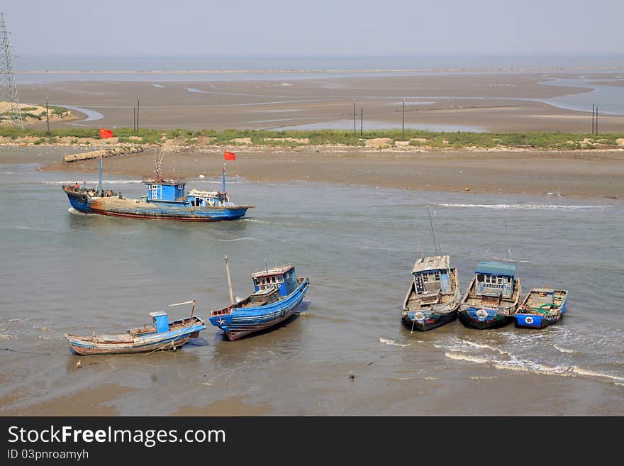 Fishing boats sailing in the water