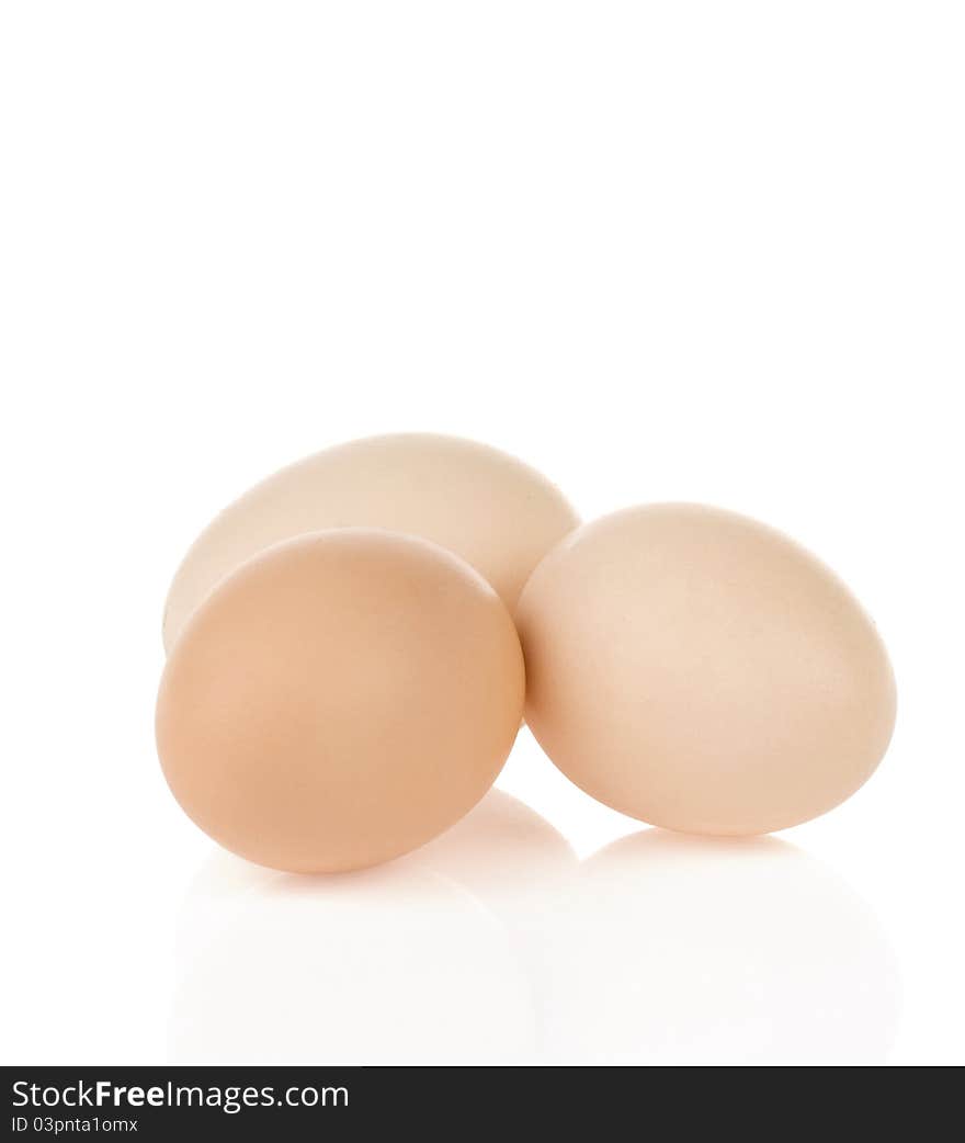 Three eggs on white background