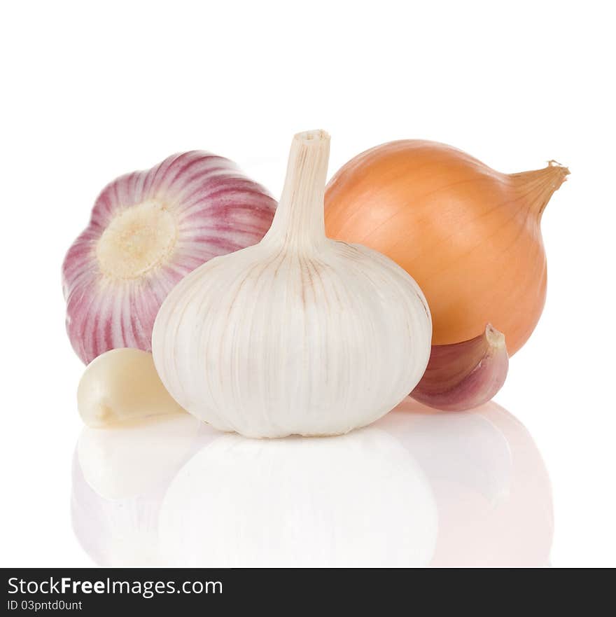 Garlics And Onion On White