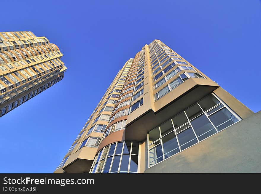 Apartment Buildings against Blue Sky