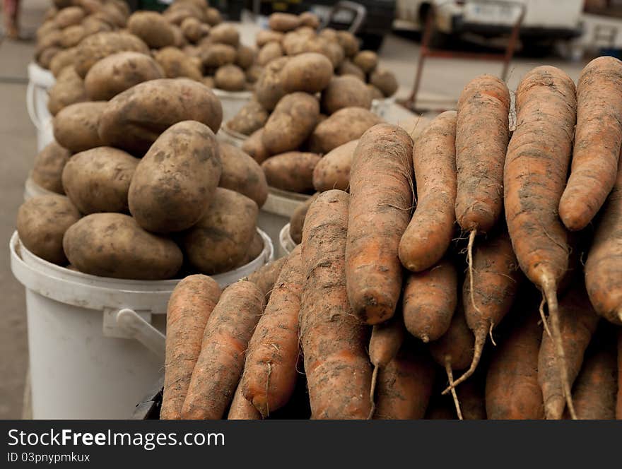 Potato and carrot on local market