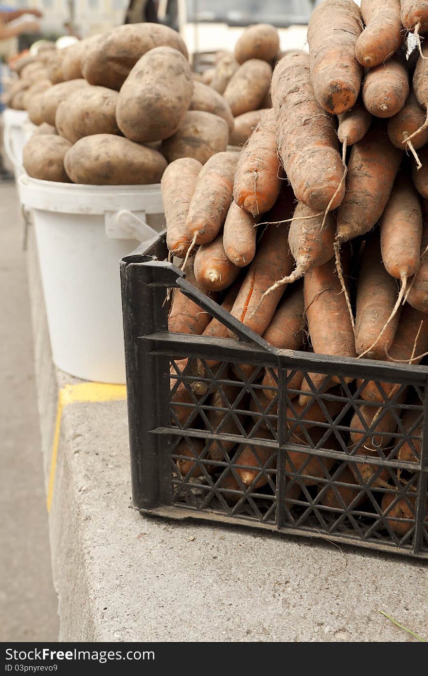 Potato and carrot on local market