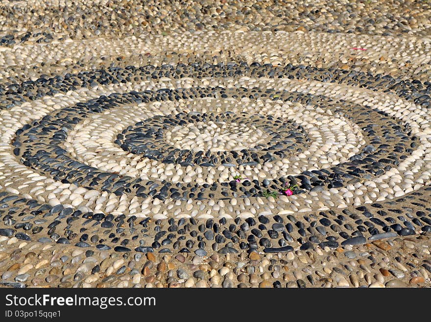 Stone building design concentric circles in a park