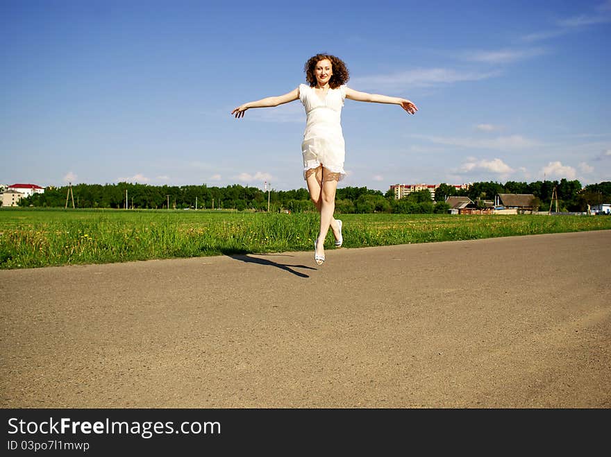 Beauty curly girl flying, levitate. Beauty curly girl flying, levitate