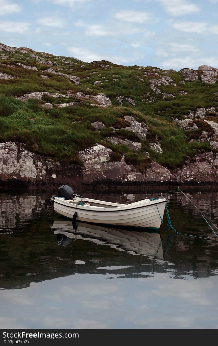 Fishing boat at a bay with scenic view in county kerry ireland. Fishing boat at a bay with scenic view in county kerry ireland