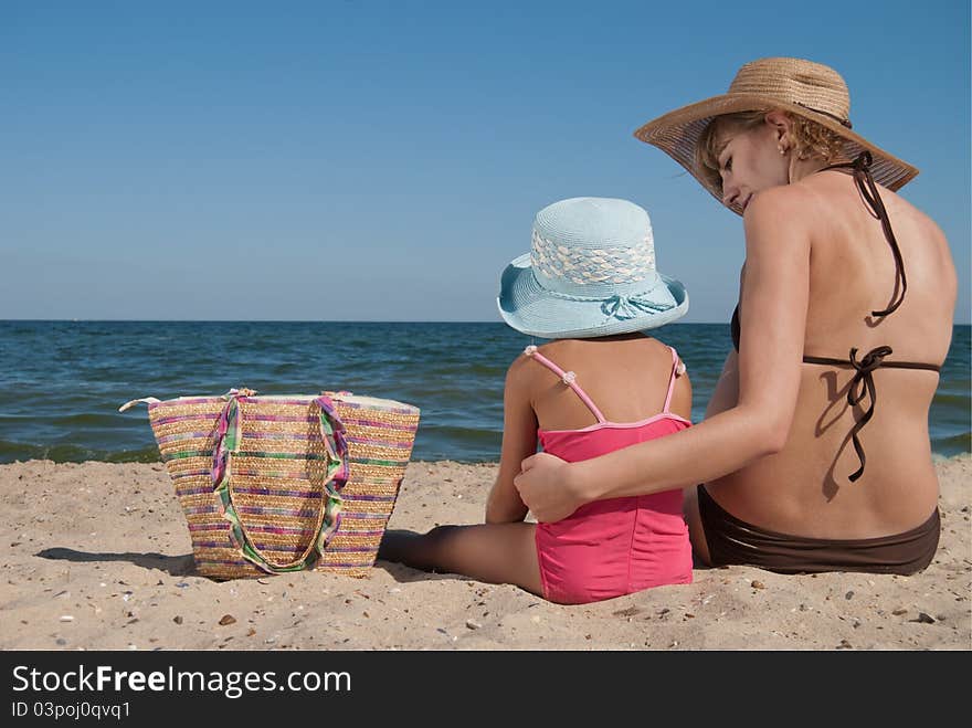 Mother with daughter on beach. Mother with daughter on beach