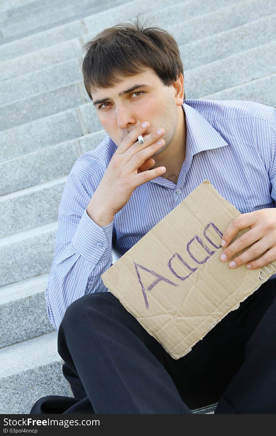 Businessman smokes