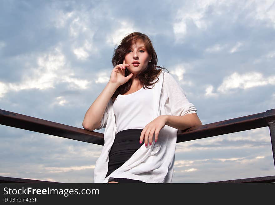 Happy woman at sunset - fashion shoot