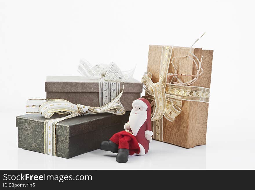 Santa Clause sitting close to christmas parcels