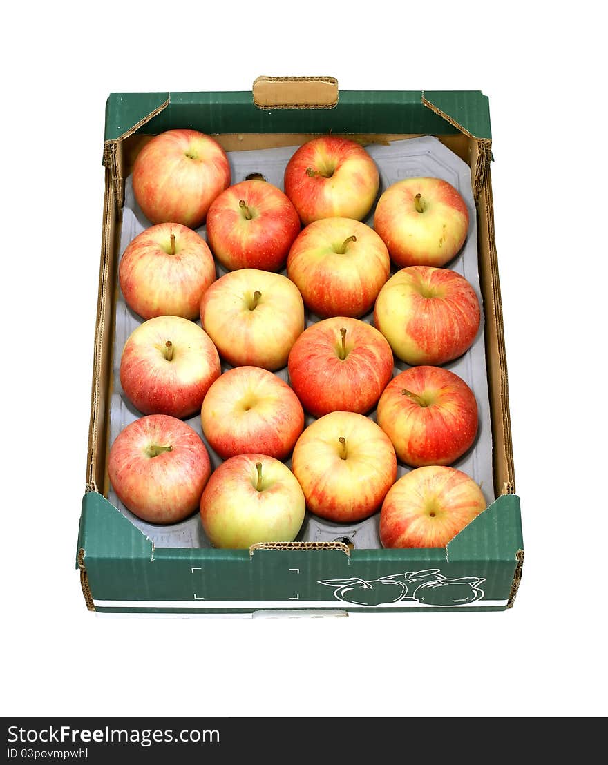 Apples in a cardboard box isolated on white background