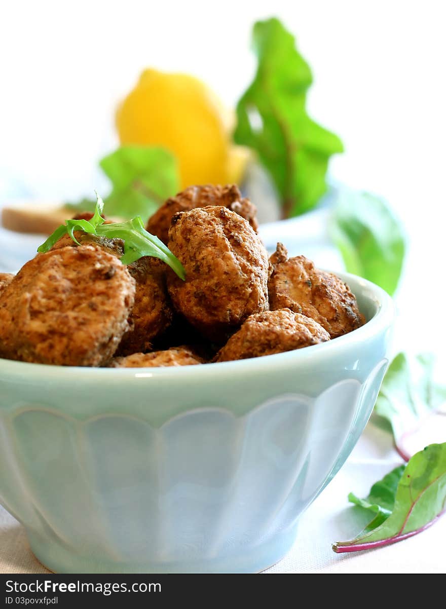 Tasty meatballs in bowl isolated on white background