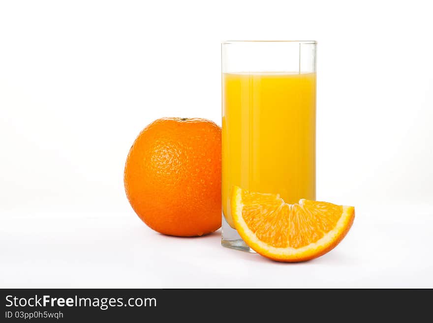 Orange juice and fruit isolated on white