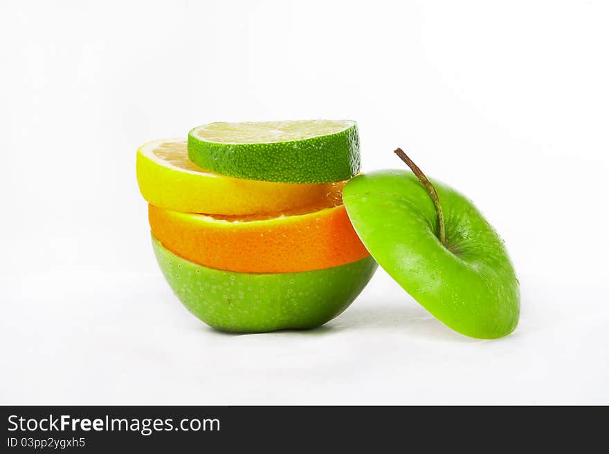 Apple and citrus fruits over white background, mix.