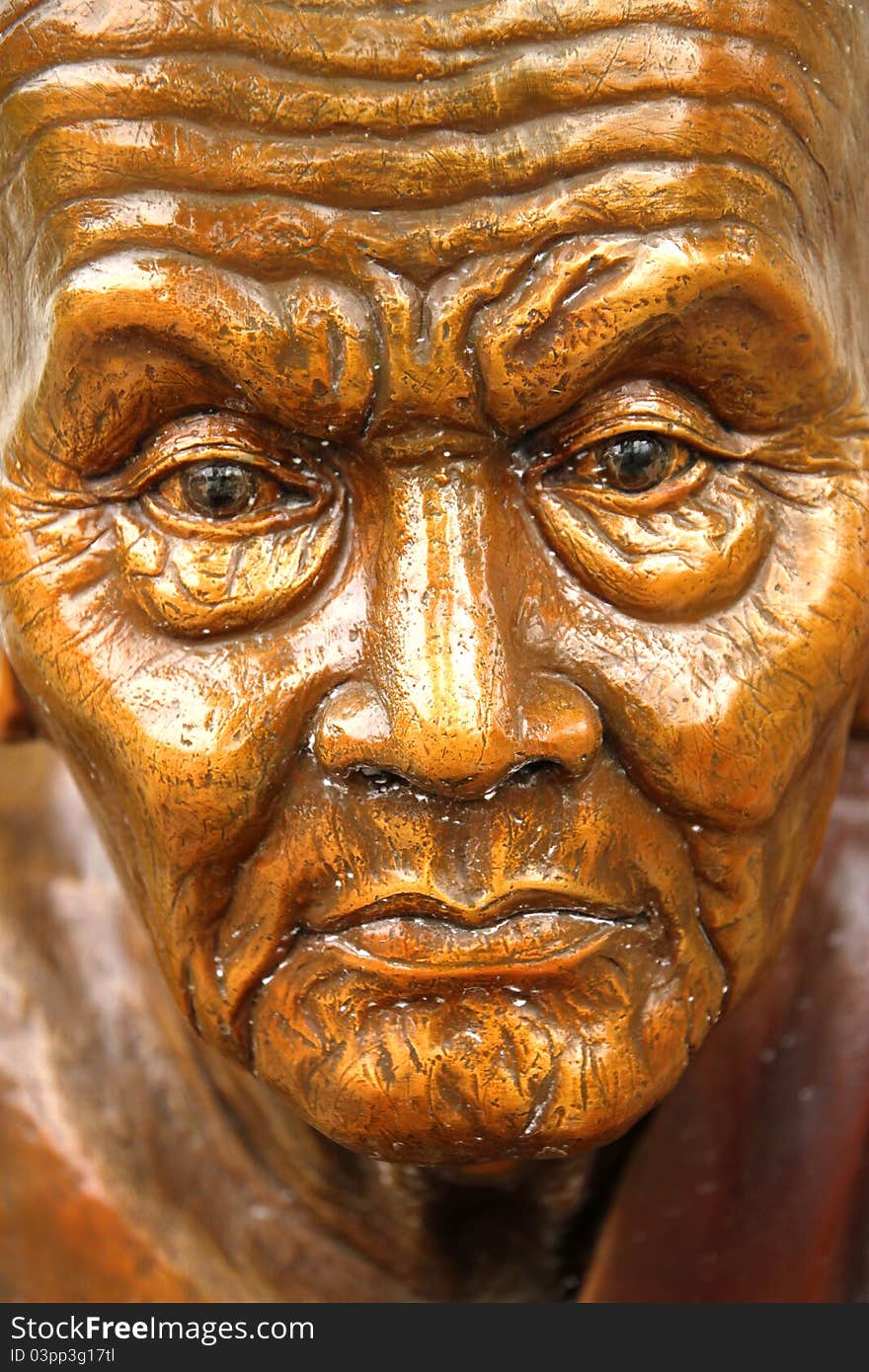 Traditional Thai style face of the monk image, Laung Poo Tuad, in front of church, Wat Naga Wichai, Mahasarakam, Thailand