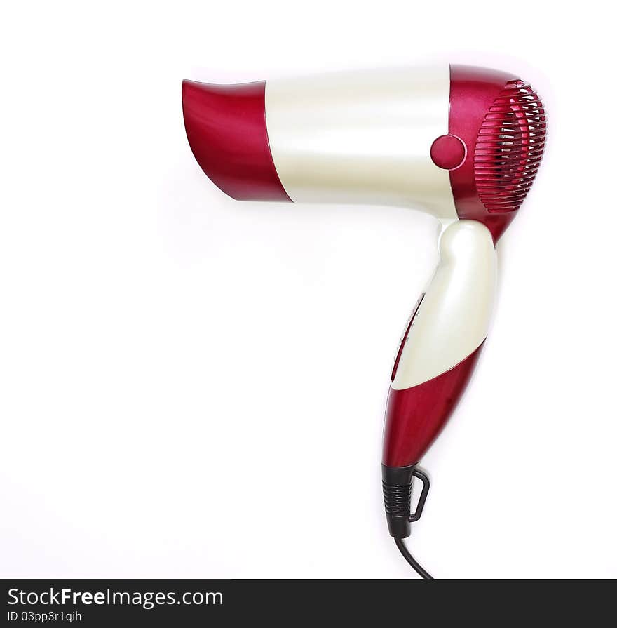 Beautiful red and white hair dryer on a white background