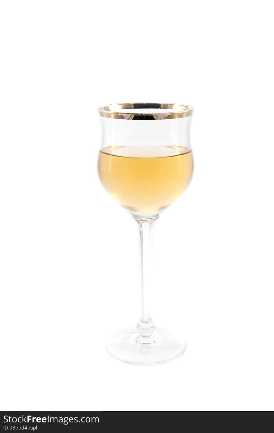 Glass of white wine on a white background. Glass of white wine on a white background