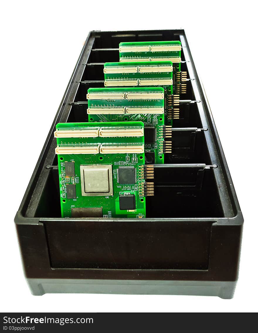 Several printed circuit boards in a container