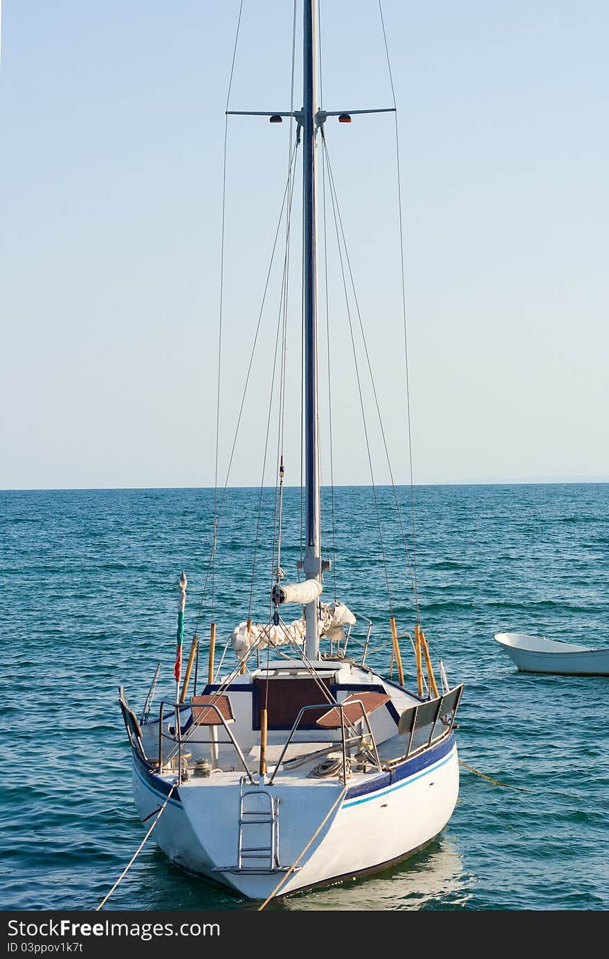 A white boat in a sea