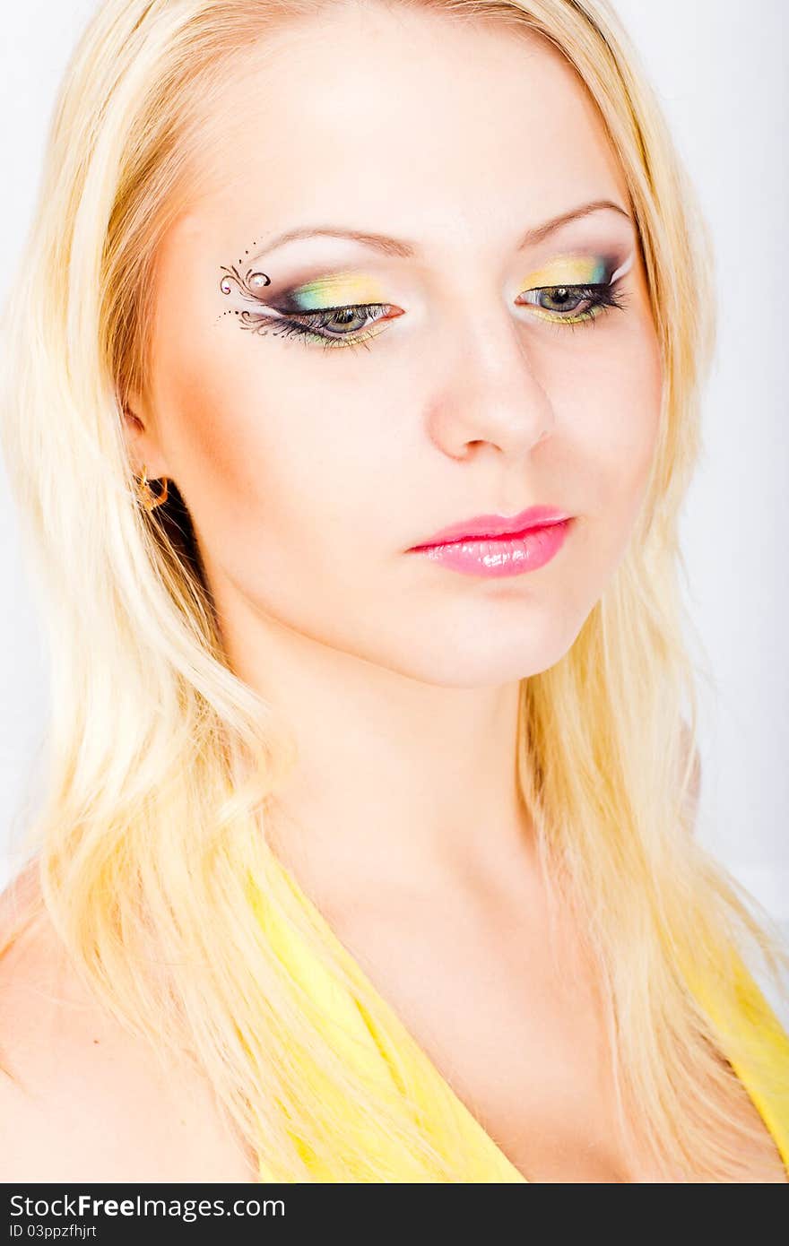 Young Beautiful Blonde Woman With Stylish Make-up