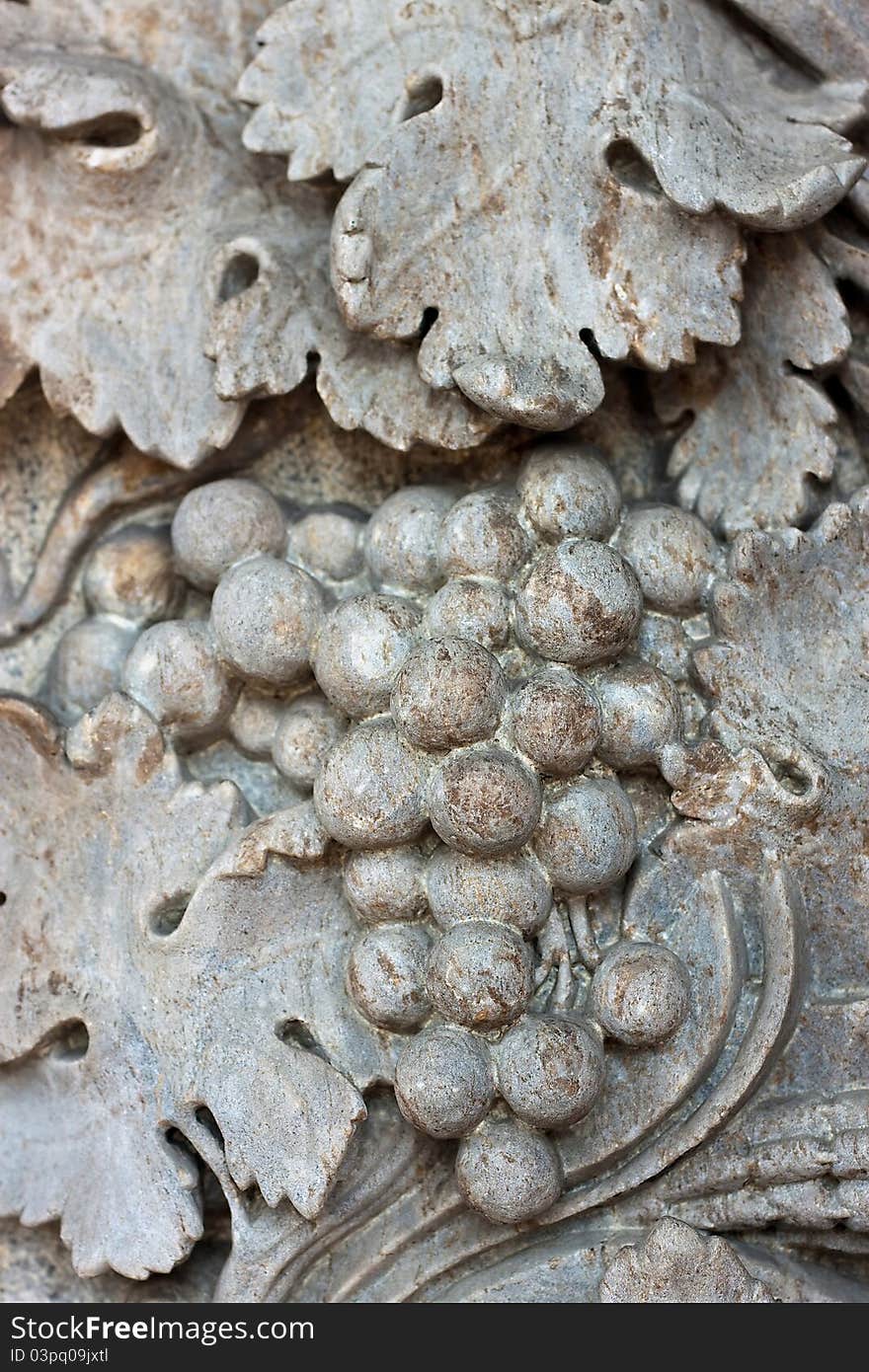 We see Gray granite grapes, part of the wall