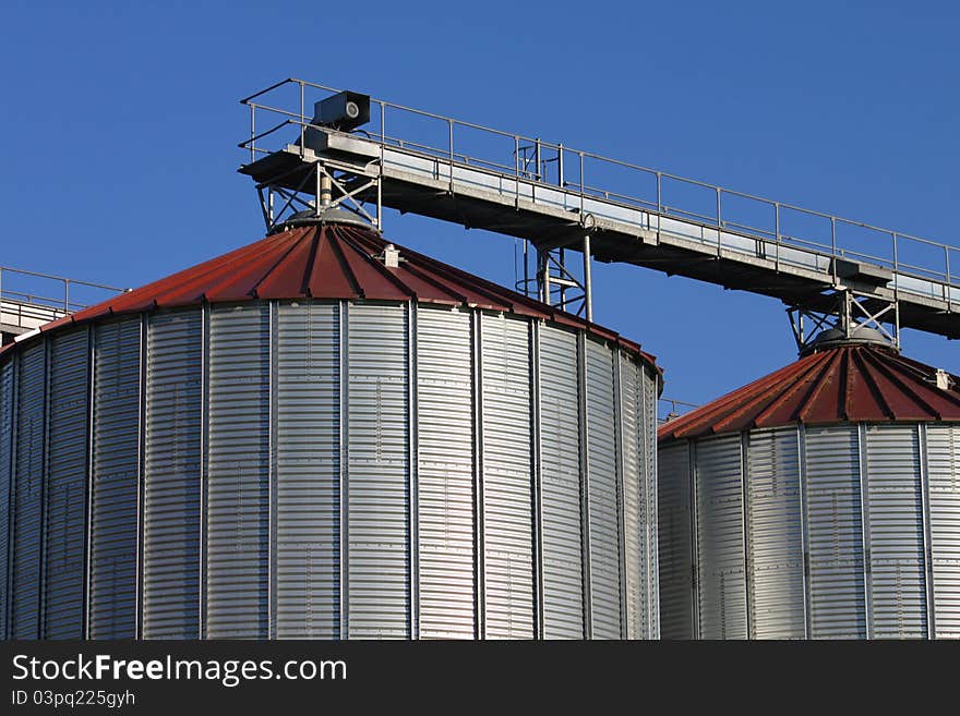 Two big metal steel silos. Two big metal steel silos