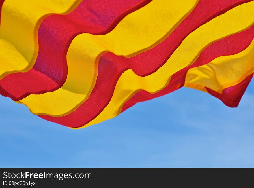 Maritime signal flag against the blue sky.