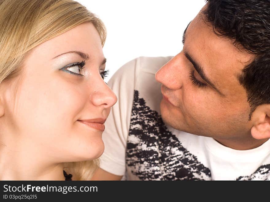 Portrait of a cute couple on a white. Portrait of a cute couple on a white