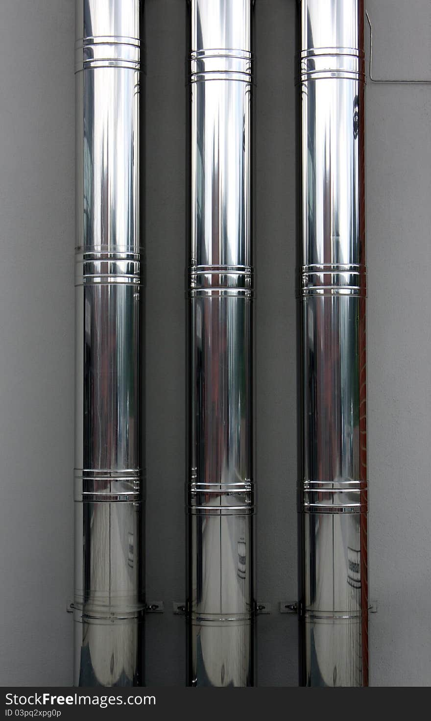 Three steel metal long tubes. Three steel metal long tubes