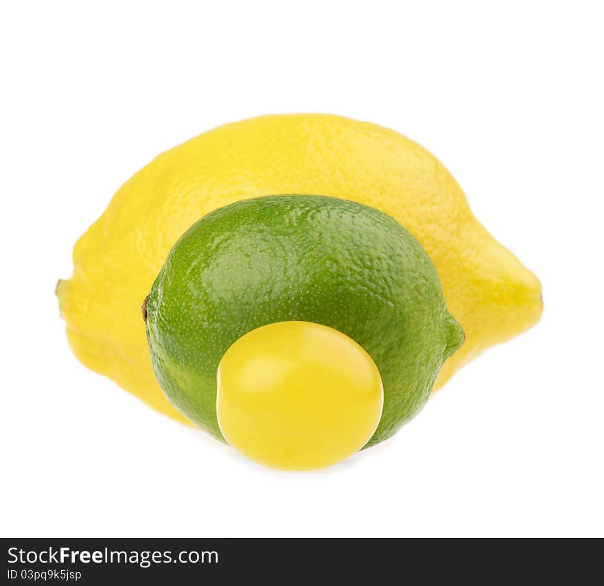 Fresh lemon lime and cherry isolated on white. Fresh lemon lime and cherry isolated on white