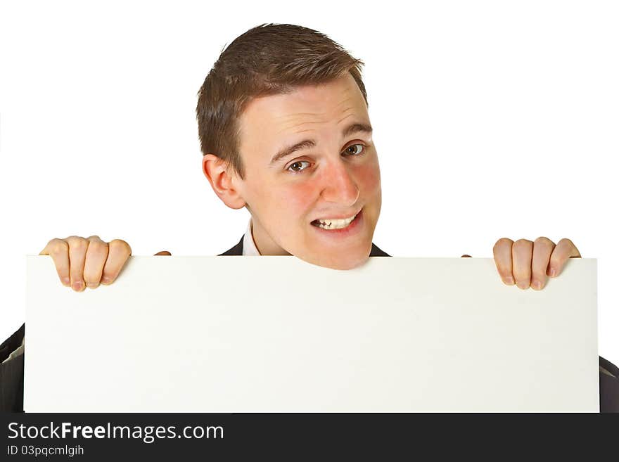 Young businessman with white board on white background