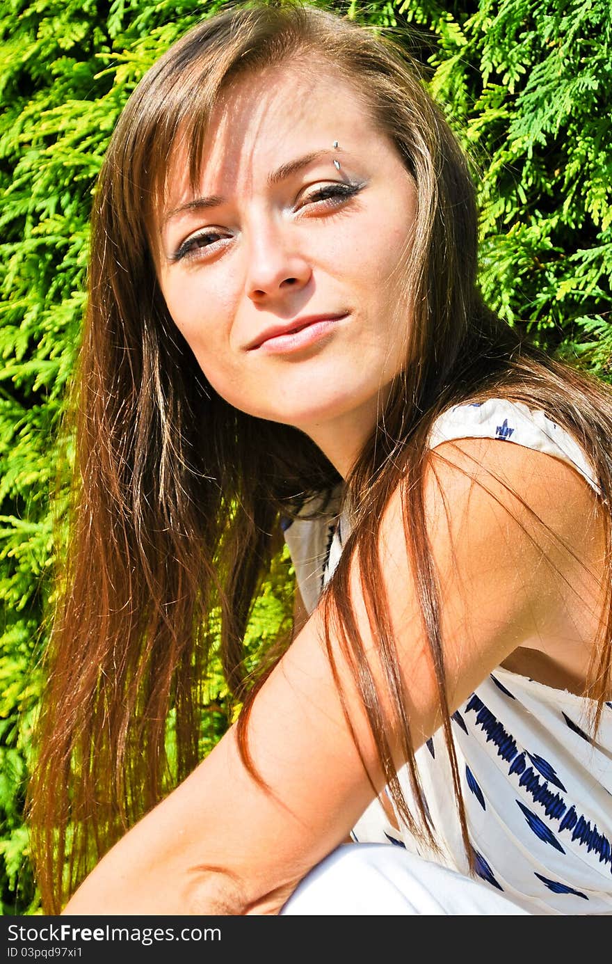 Beautiful Ukrainian girl standing in the park. Beautiful Ukrainian girl standing in the park