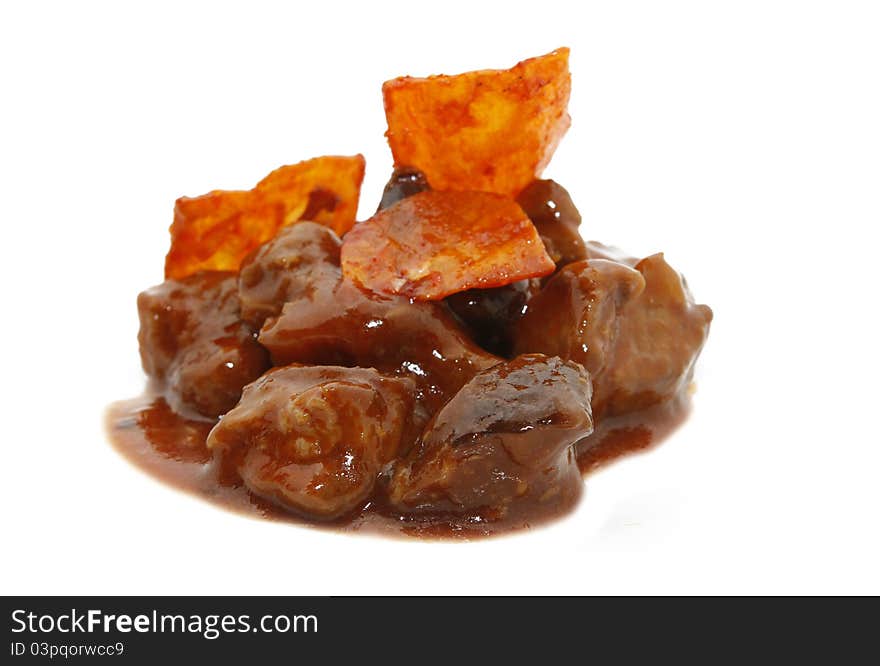 Sweet and sour pork with spicy cassava. Sweet and sour pork with spicy cassava