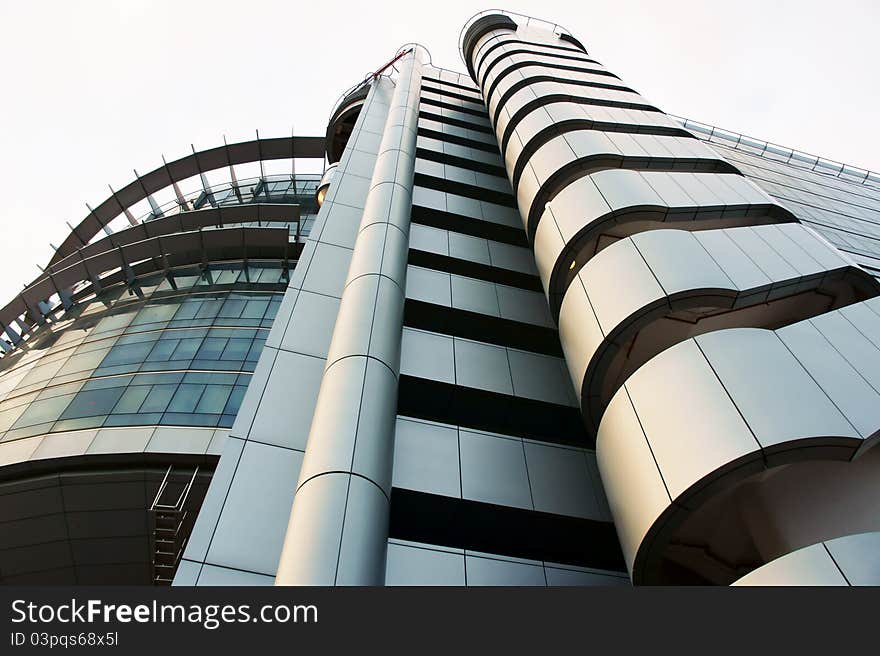 Side lower angle view of a Futuristic looking building. Side lower angle view of a Futuristic looking building