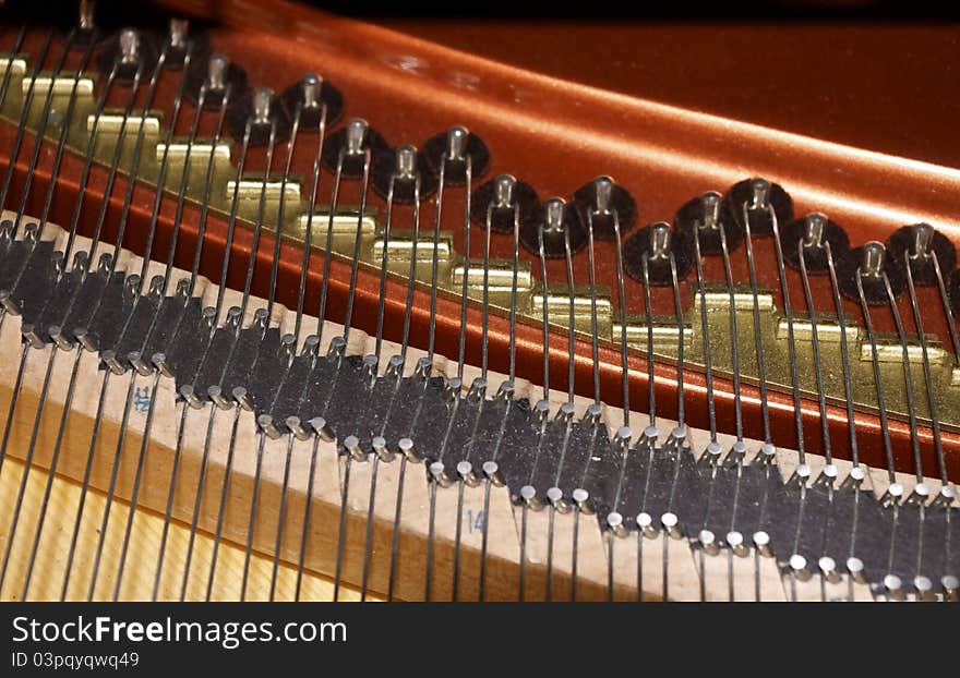 Inner workings of baby grand piano. Inner workings of baby grand piano