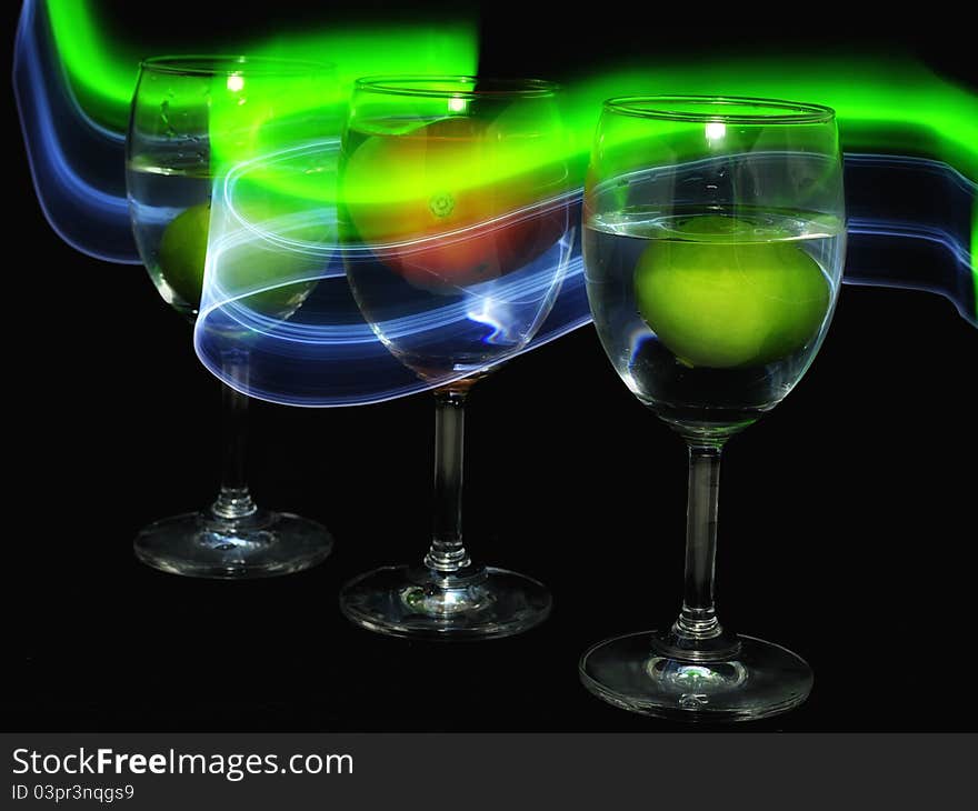 Light trail with the glass and the vegetables inside it. Light trail with the glass and the vegetables inside it.