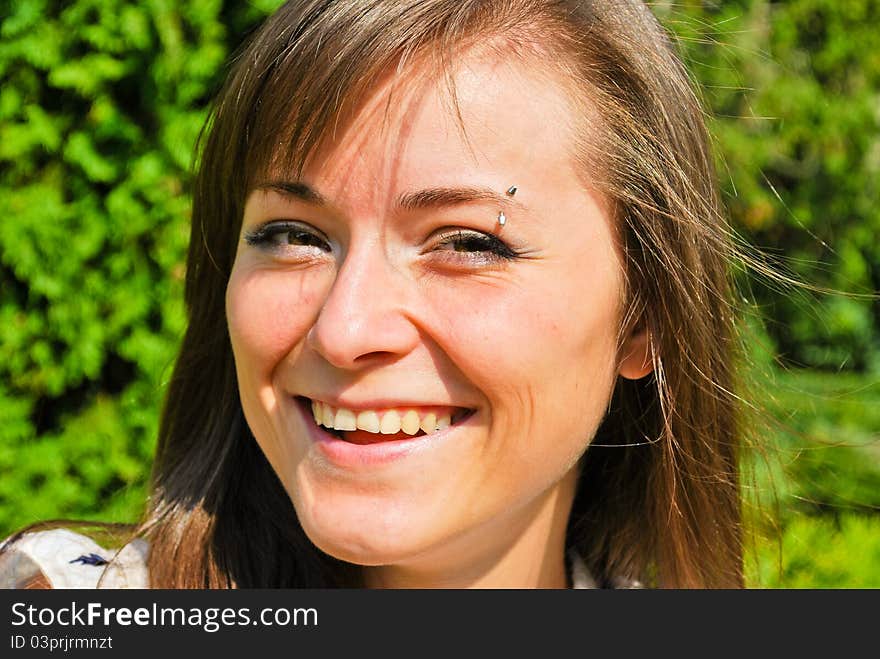 Beautiful Ukrainian girl standing in the park. Beautiful Ukrainian girl standing in the park