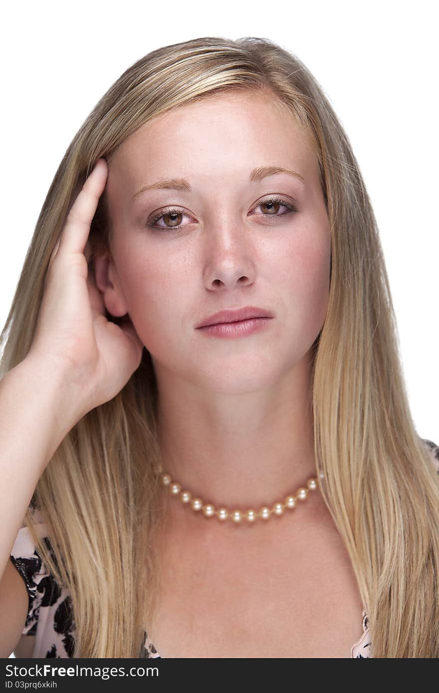 Beautiful young blond model in studio shot against white background. Beautiful young blond model in studio shot against white background