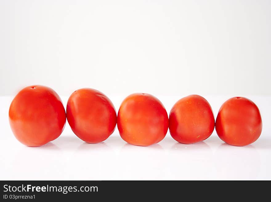 Five tomatoes