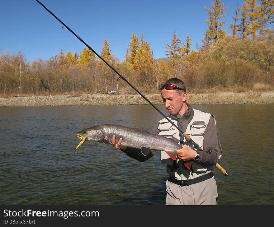 Fishing - fisherman catched big fish