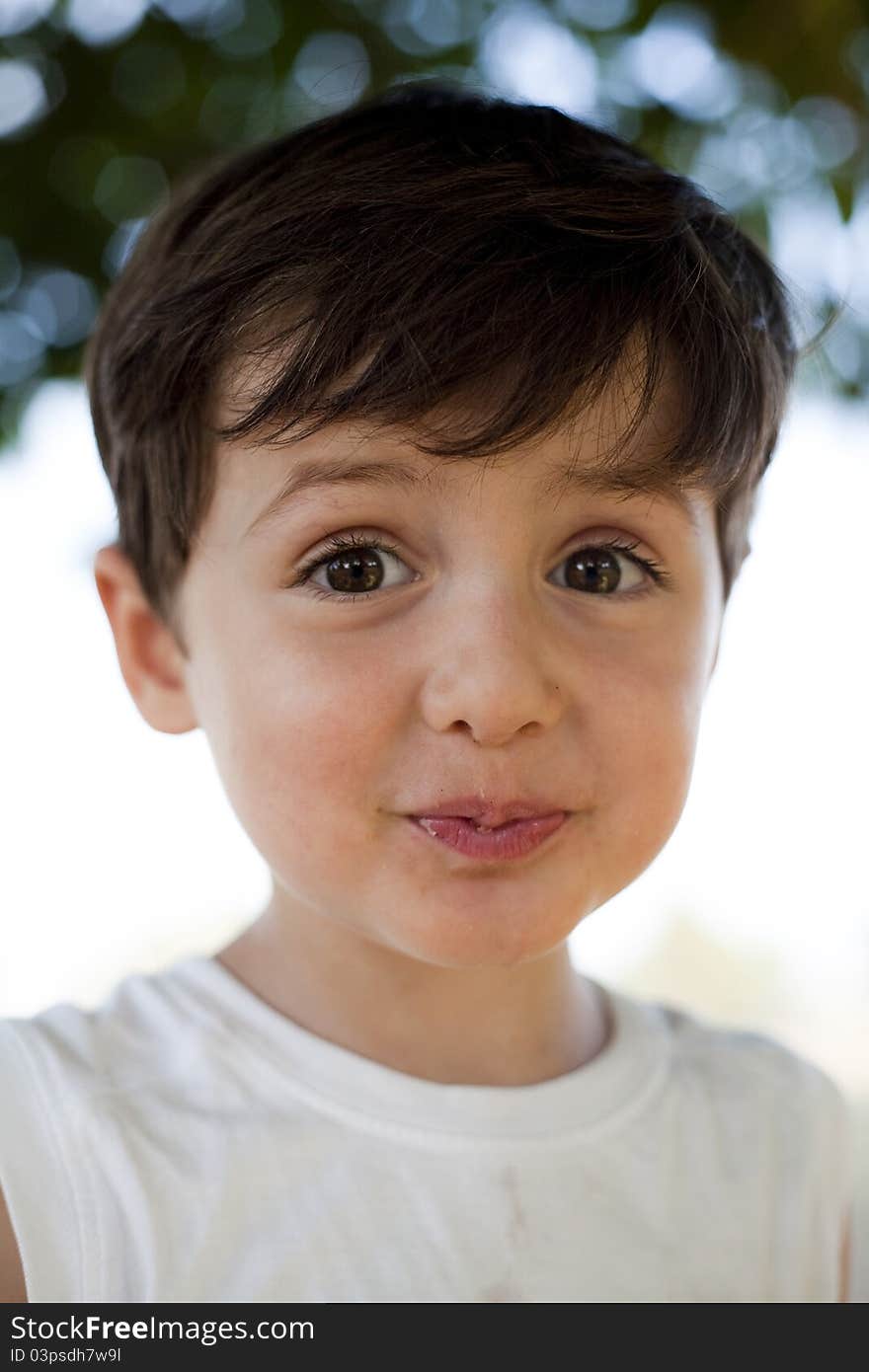 Child close up portrait doing faces outdoor. Child close up portrait doing faces outdoor