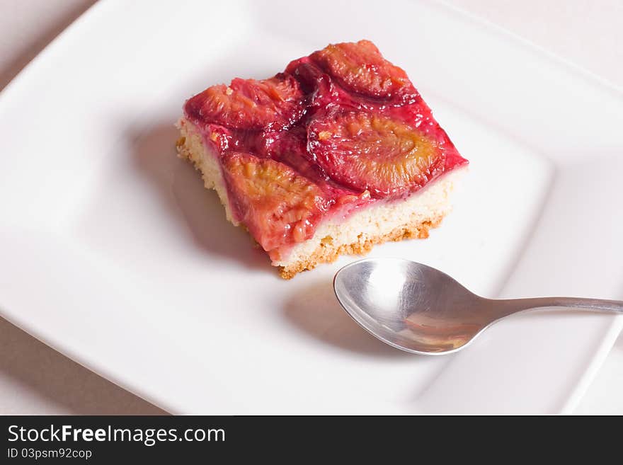 Piece of cake with plums