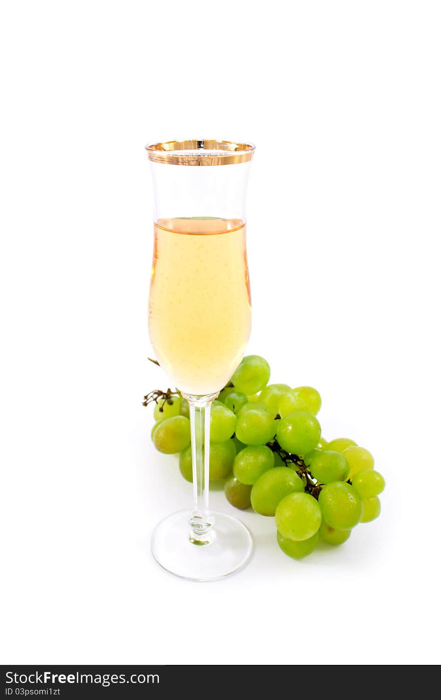 Glass of white wine on a white background. Glass of white wine on a white background