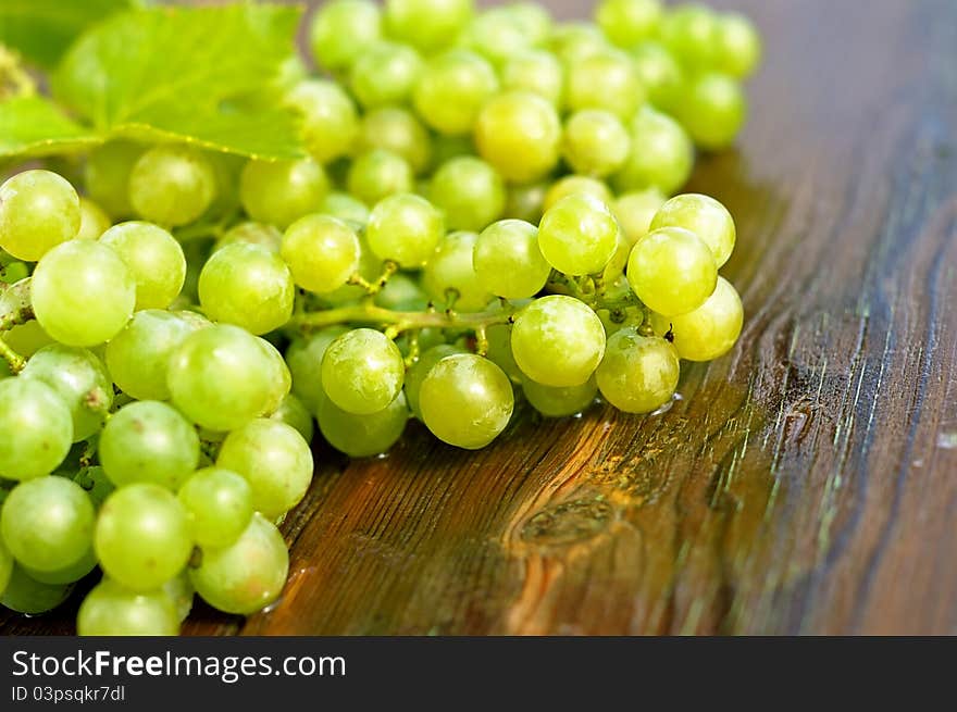 Grapes on a wooden table.