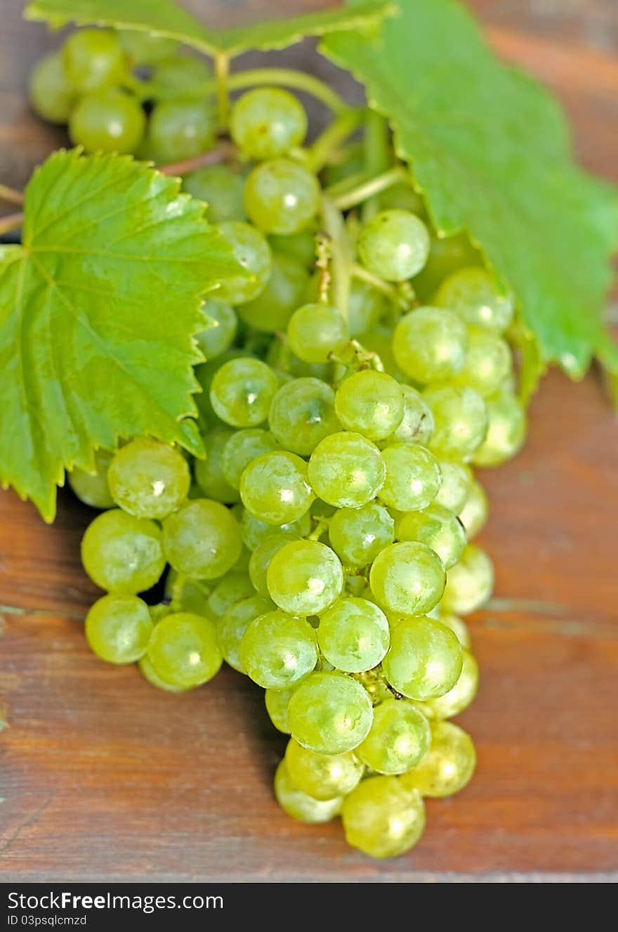 Grapes on a wooden table.